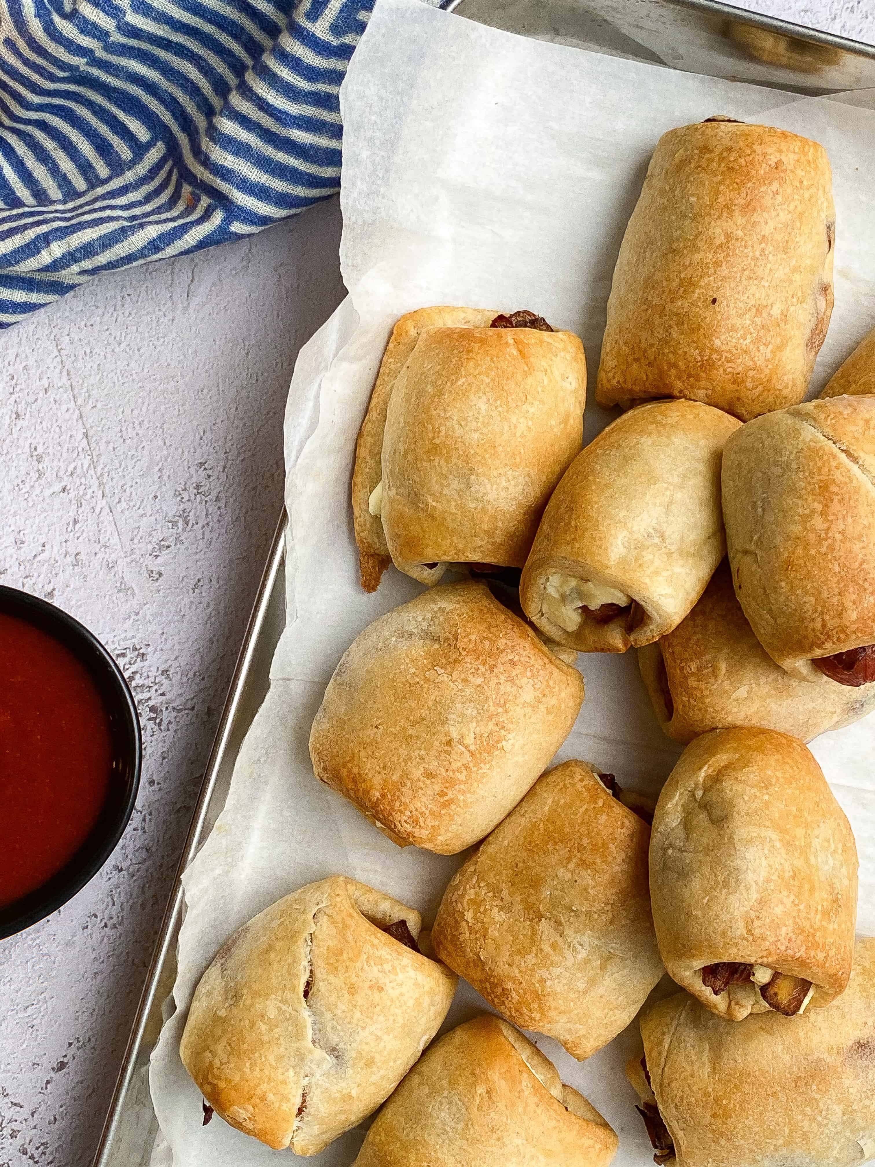 Pigs in a Blanket Seattle Style (Cream Cheese & Onions) bites with bri