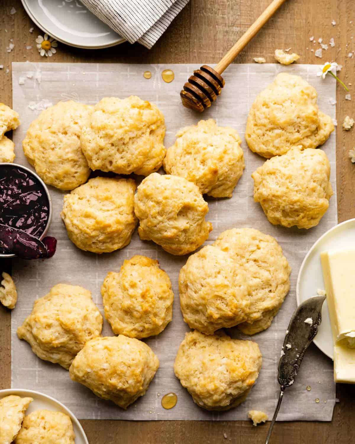 Drop biscuits no milk on a piece of parchment paper. 