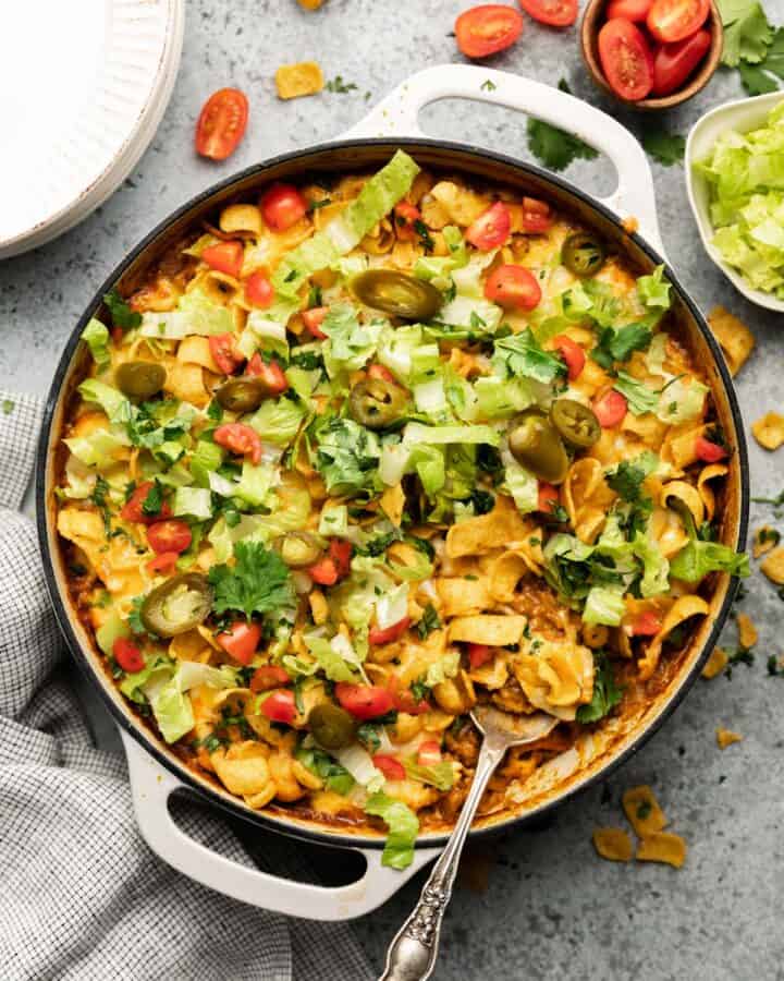 Baked Walking Taco Casserole Recipe with Enchilada Sauce Bites with Bri