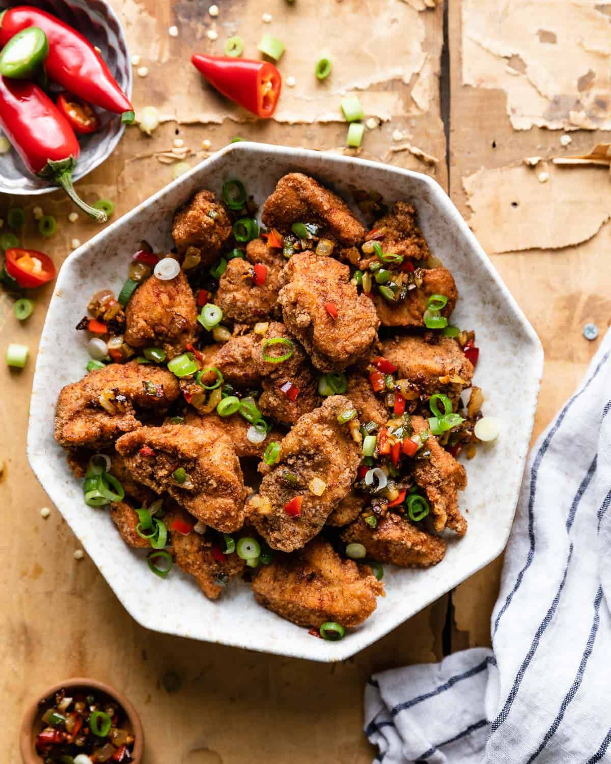 overhead of salt and pepper chicken in a bowl