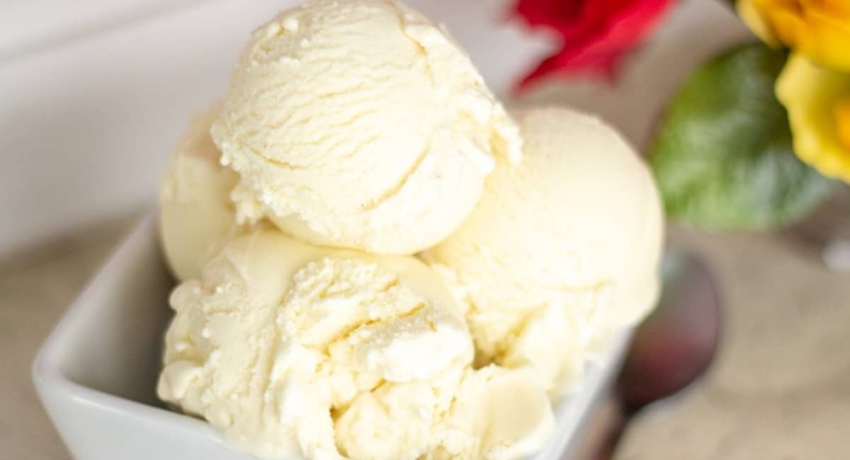 Cannoli ice cream served in a white ramekin.