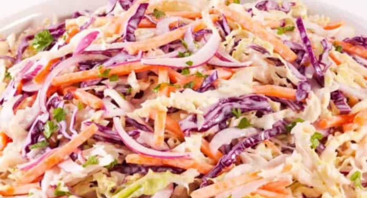 Keto coleslaw in a white bowl.