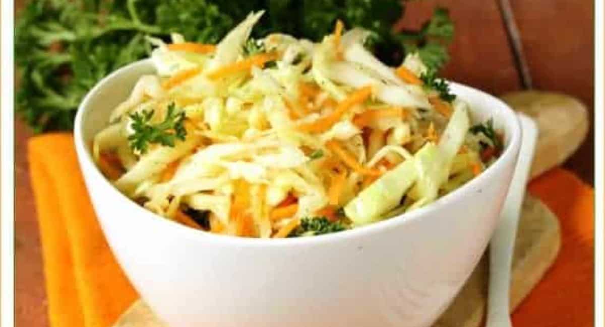 Coleslaw in a white bowl.