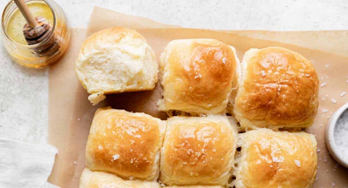 Yeast rolls on parchment paper.