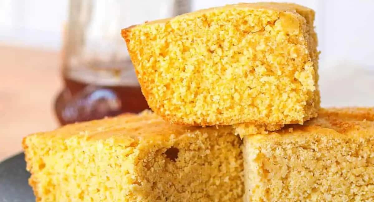 Gluten free cornbread sliced and on top of more cornbread.