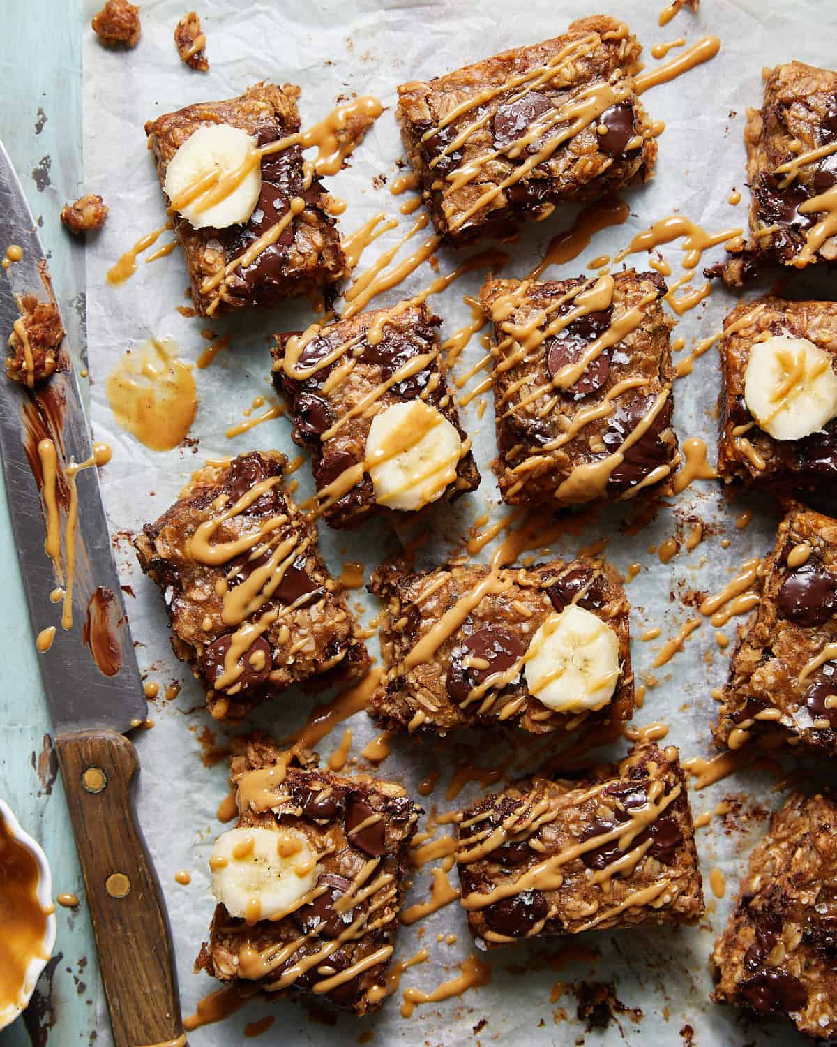 Peanut butter banana bars on parchment paper.