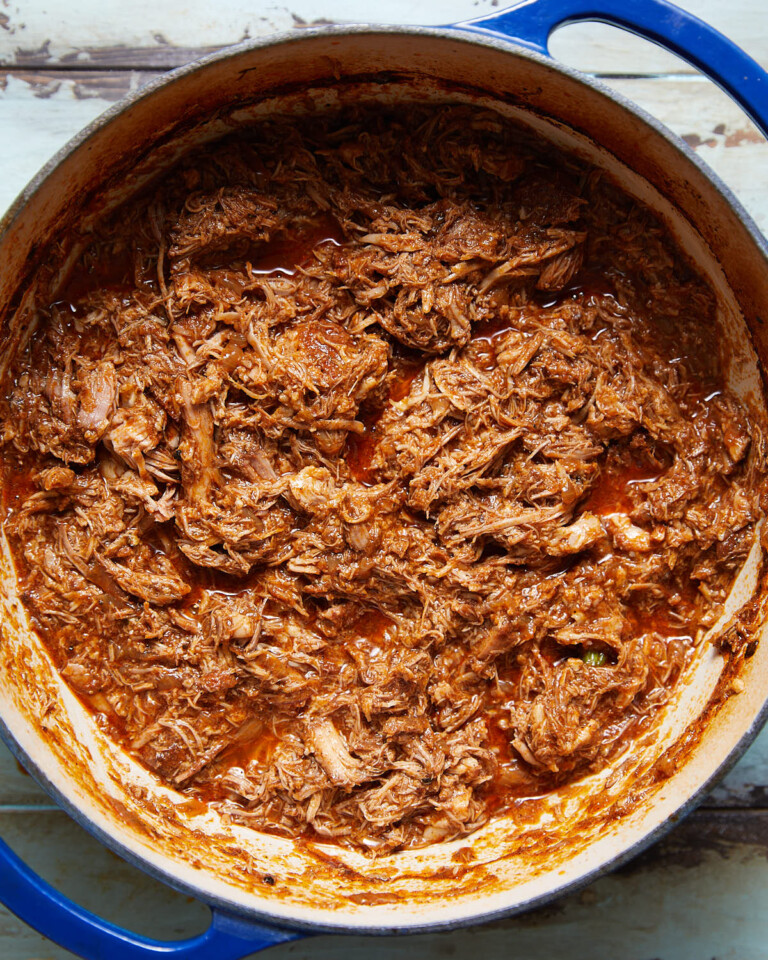 Dutch Oven Pulled Pork Recipe - Bites with Bri