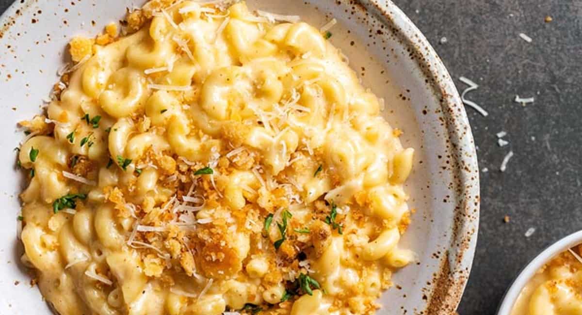 Photo of broccoli cheese casserole in white dish. 