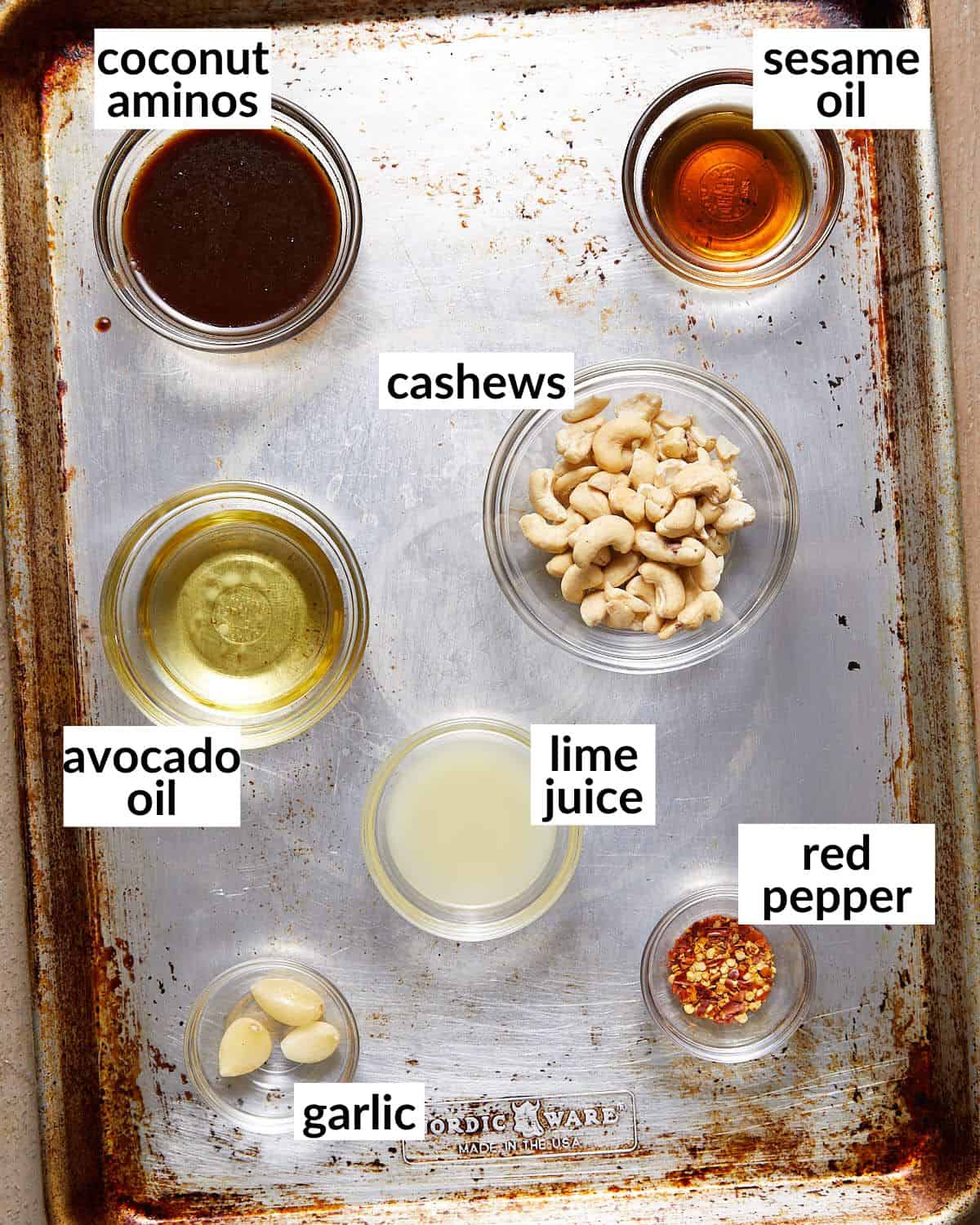 Overhead image of ingredients needed to make spicy cashew dressing.