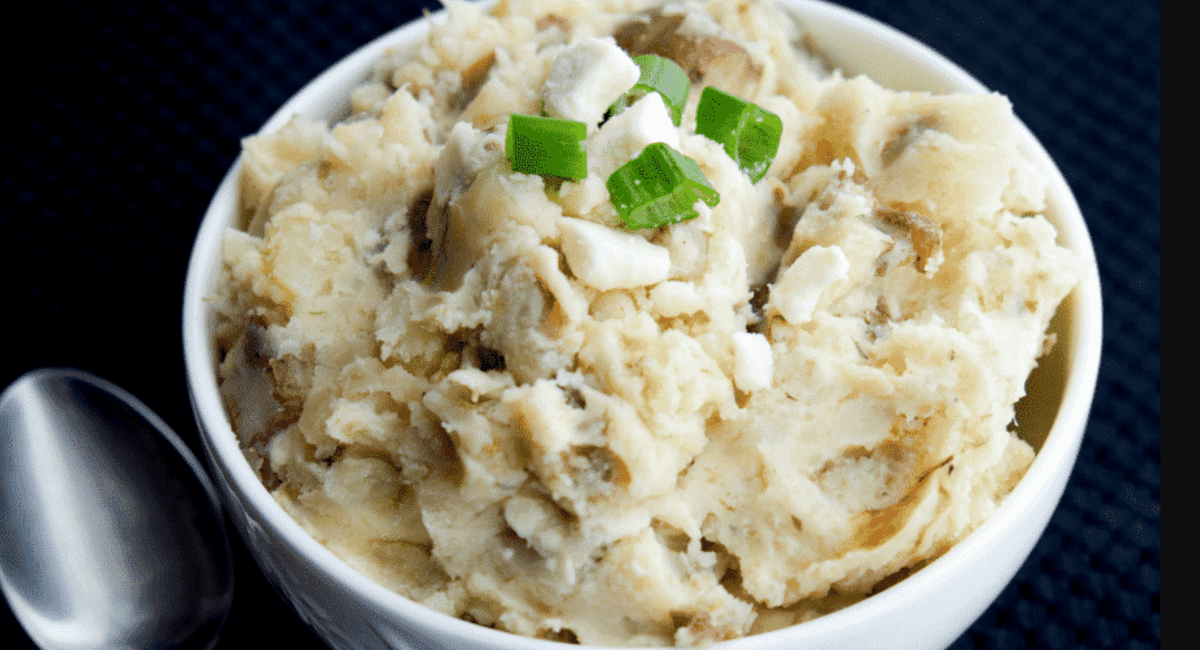 Up close image of crock pot greek mashed potatoes.