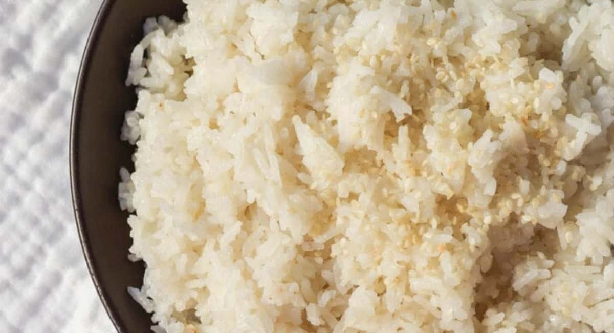Up close image of coconut rice with garnish.