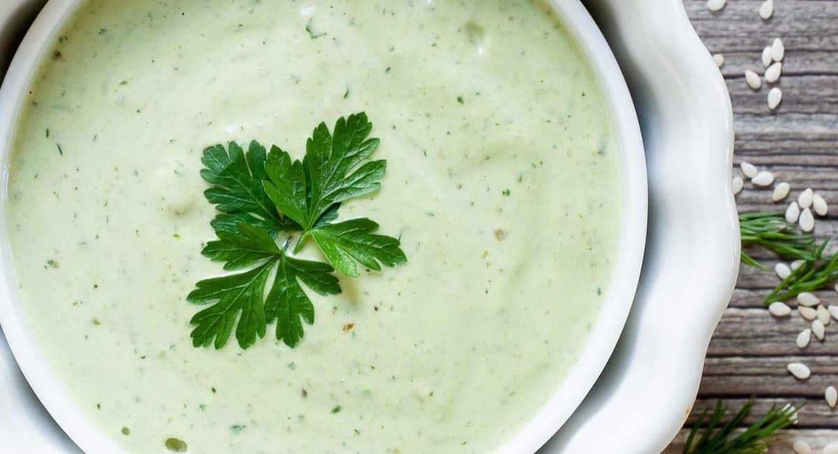 Overhead image of lemon herb tahini sauce.