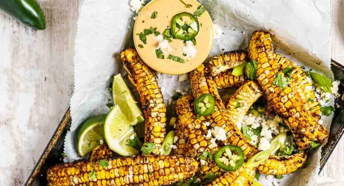 Overhead image of corn ribs with garnish.