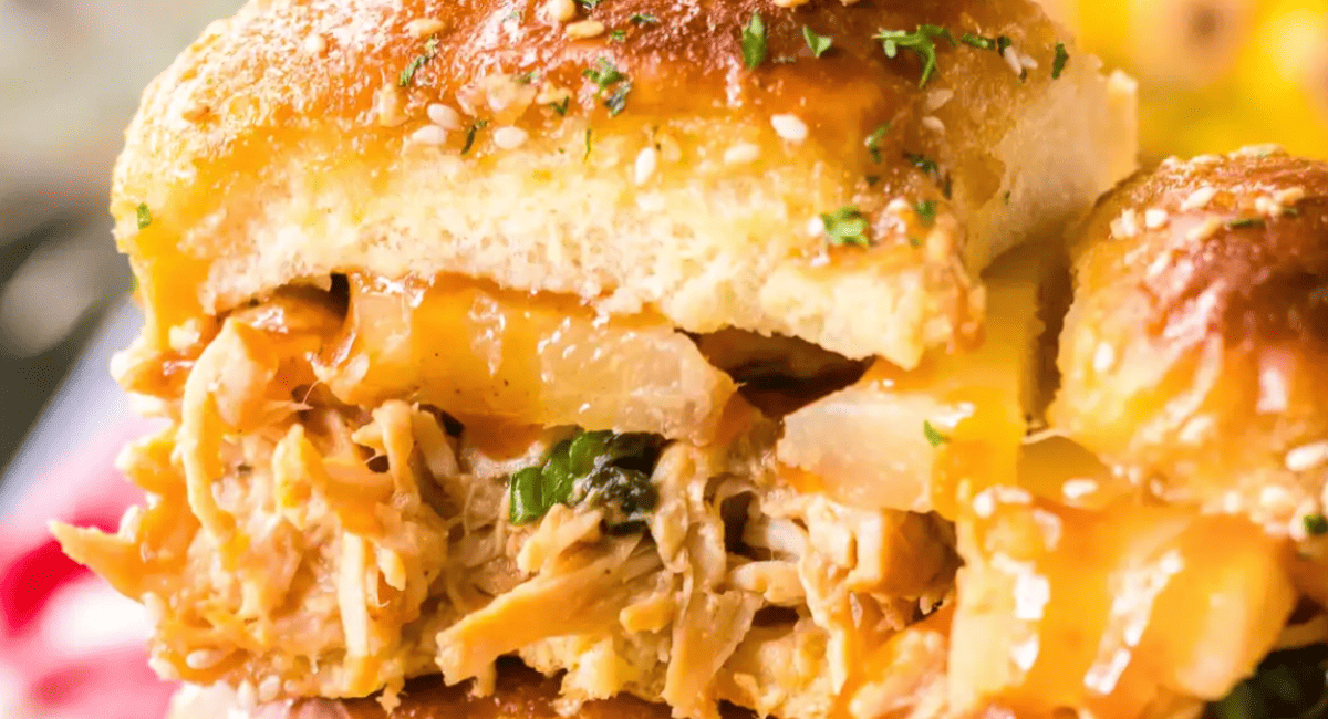 Up close image of slow cooker bbq Hawaiian roll chicken sliders.