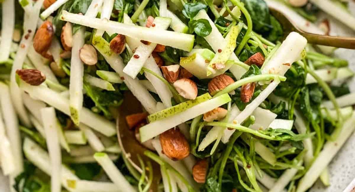 Up close image of watercress salad.