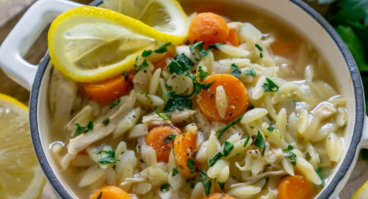 Up close image of lemon orzo chicken soup.