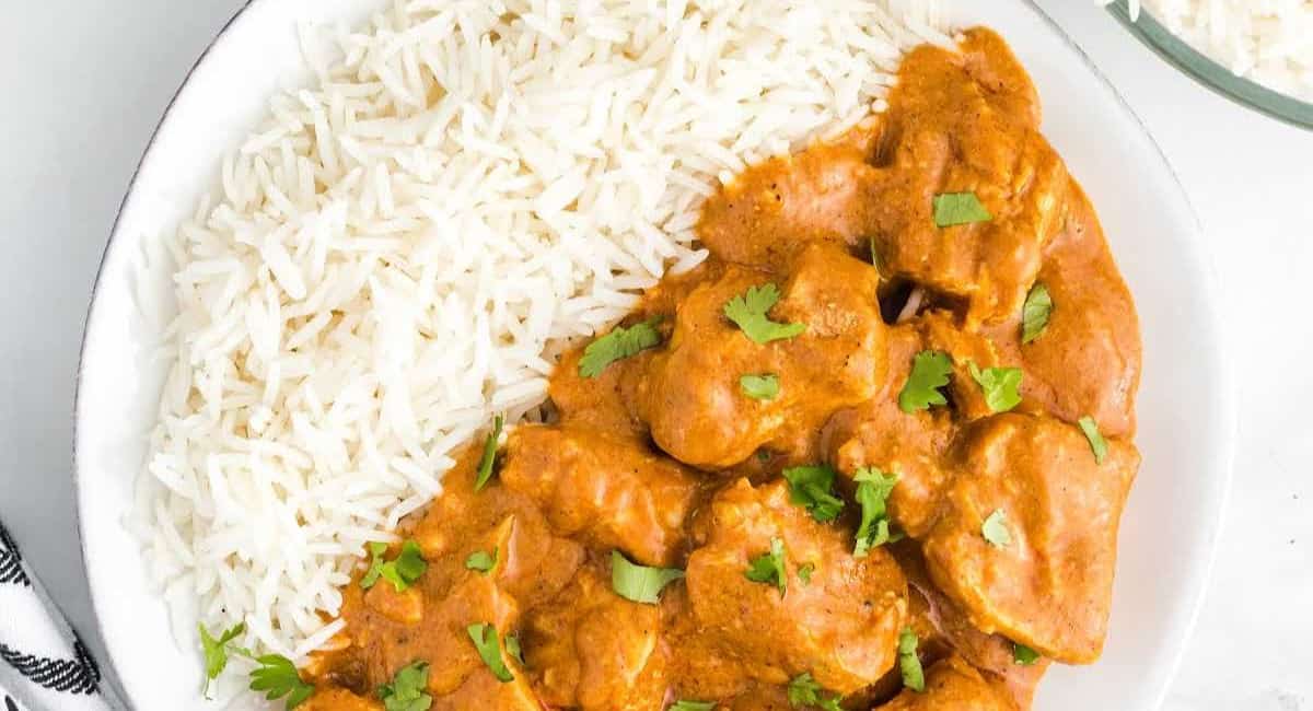 Overhead image of slow cooker butter chicken.