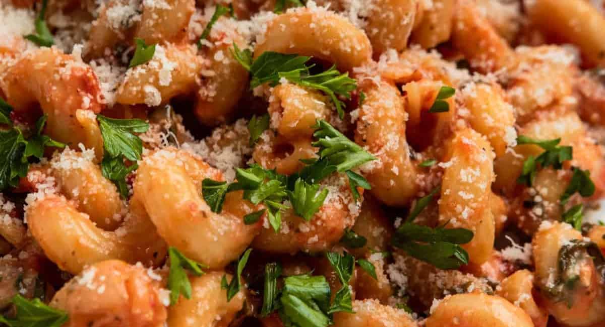 Up close image of creamy one pot pasta with garnish.