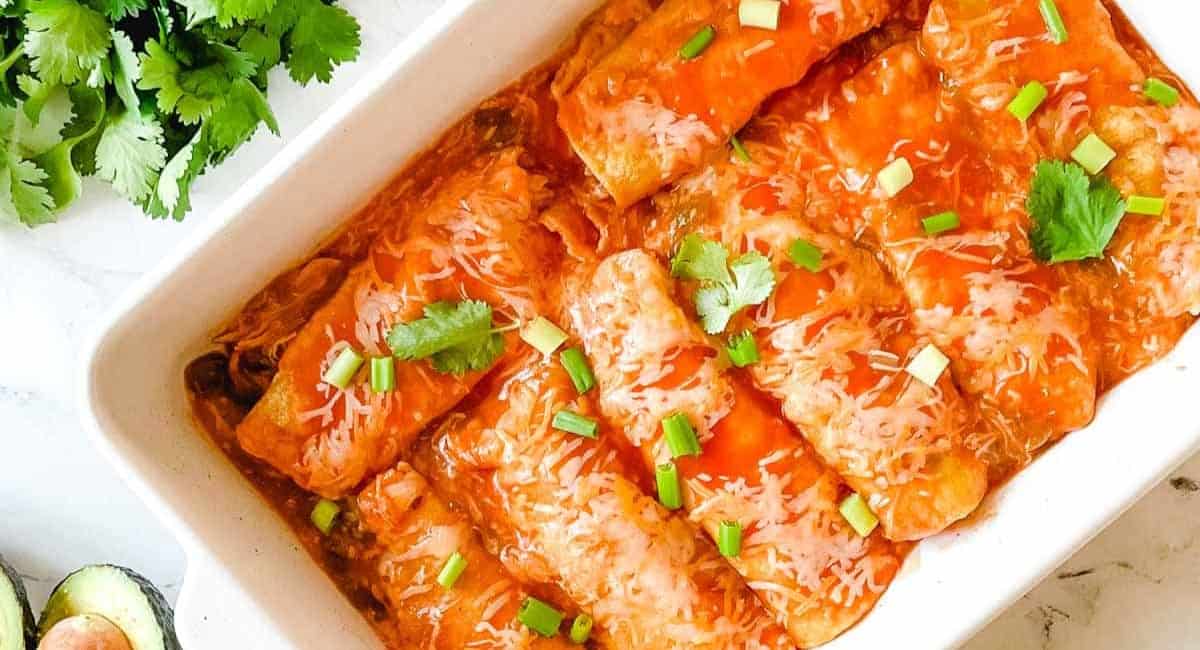 Overhead image of slow cooker chicken enchiladas.