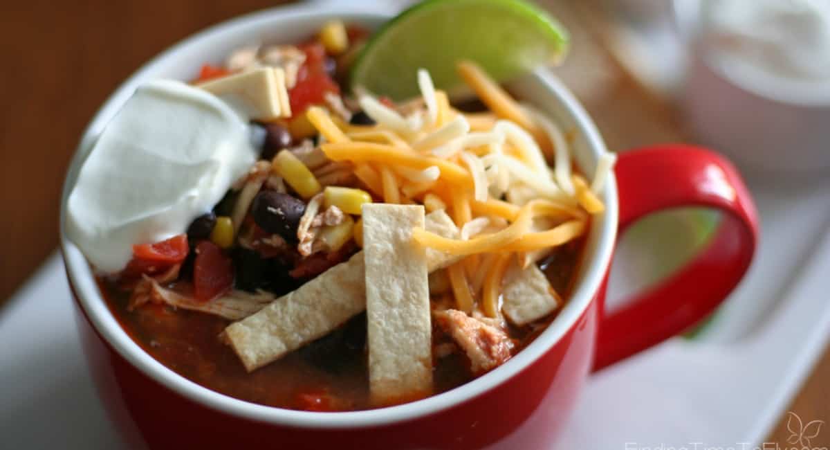 Slow cooker chicken tortilla soup in a mug.