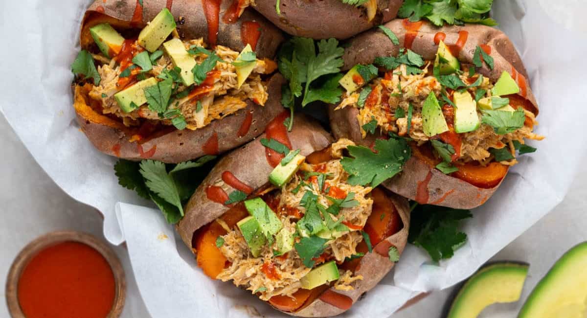 Overhead image of buffalo chicken sweet potatoes.