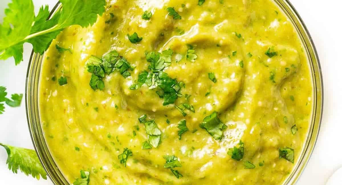 Up close image of creamy tomatillo avocado salsa verde. 