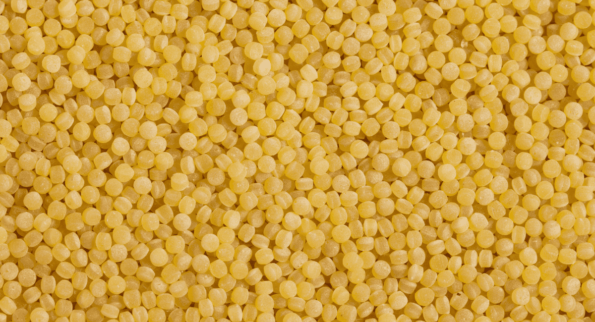 Up close image of acini di pepe pasta.