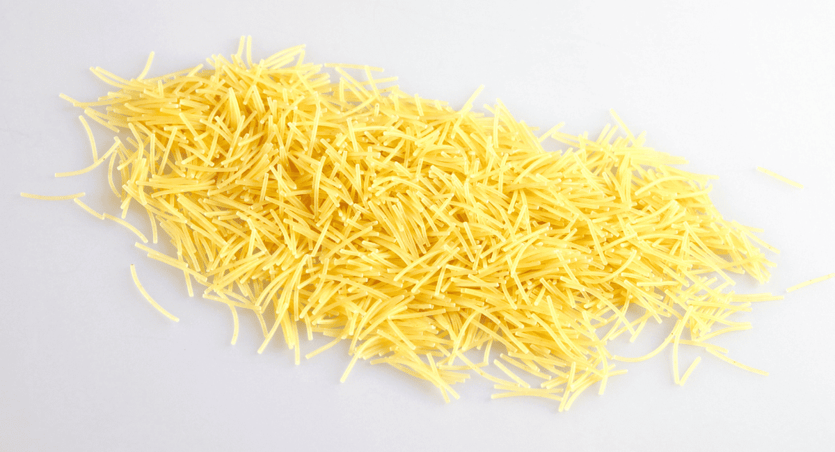 Overhead image of broken spaghetti.