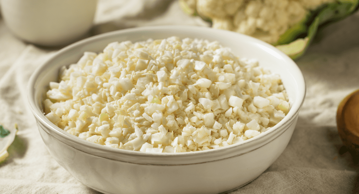 Image of cauliflower rice in white bowl.