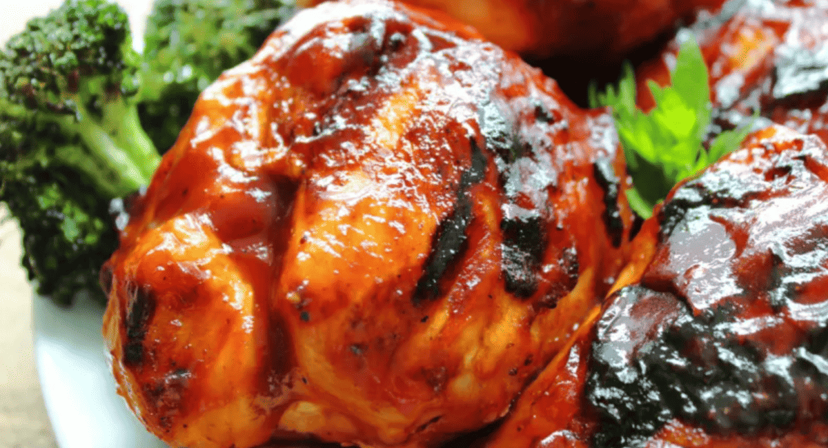 Up close image of grilled split chicken breasts.