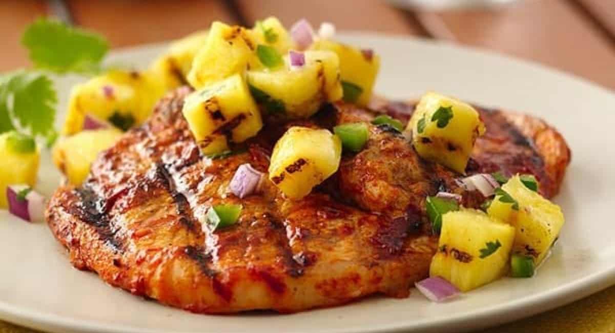 Up close image of pork chops al pastor.