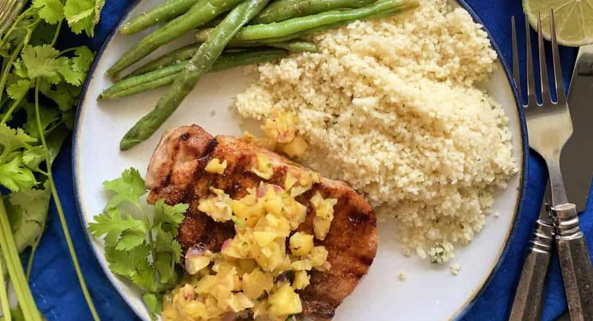 Overhead image of southwestern grilled pork chops with mango peach salsa.