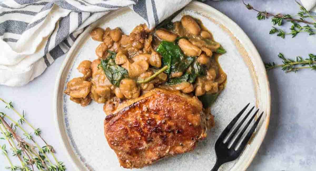 Overhead image of boneless pork chop skillet dinner. 