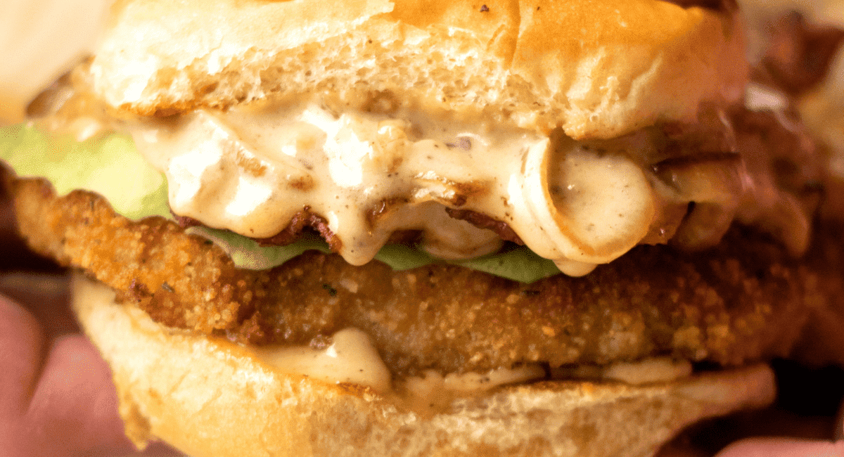 Up close image of pork chop sandwich.