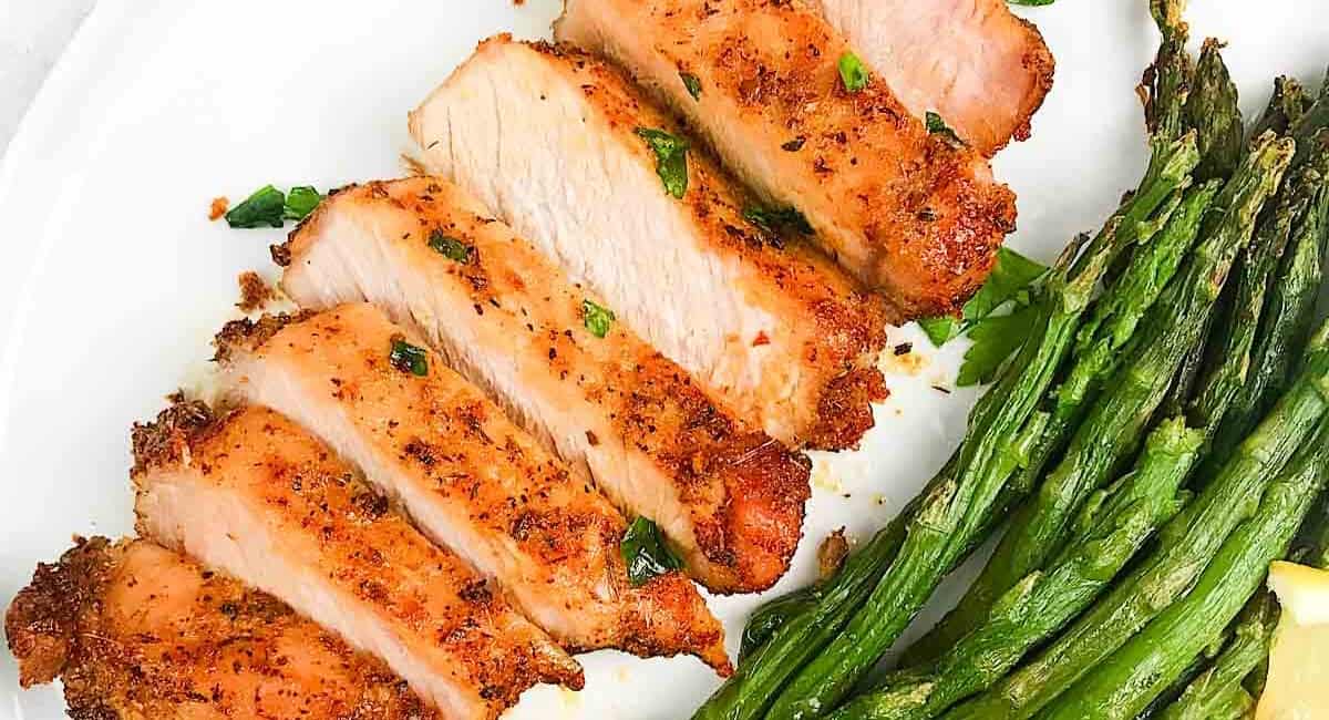 Overhead image of air fryer pork chops with no breading.