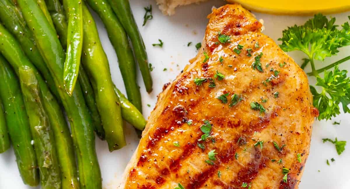 Overhead image of baked pork chops.