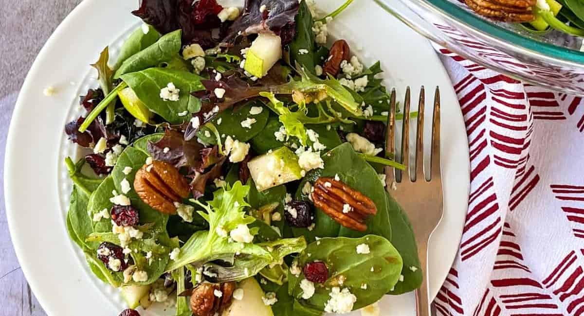 Overhead image of candied pecan and cranberry pear salad.