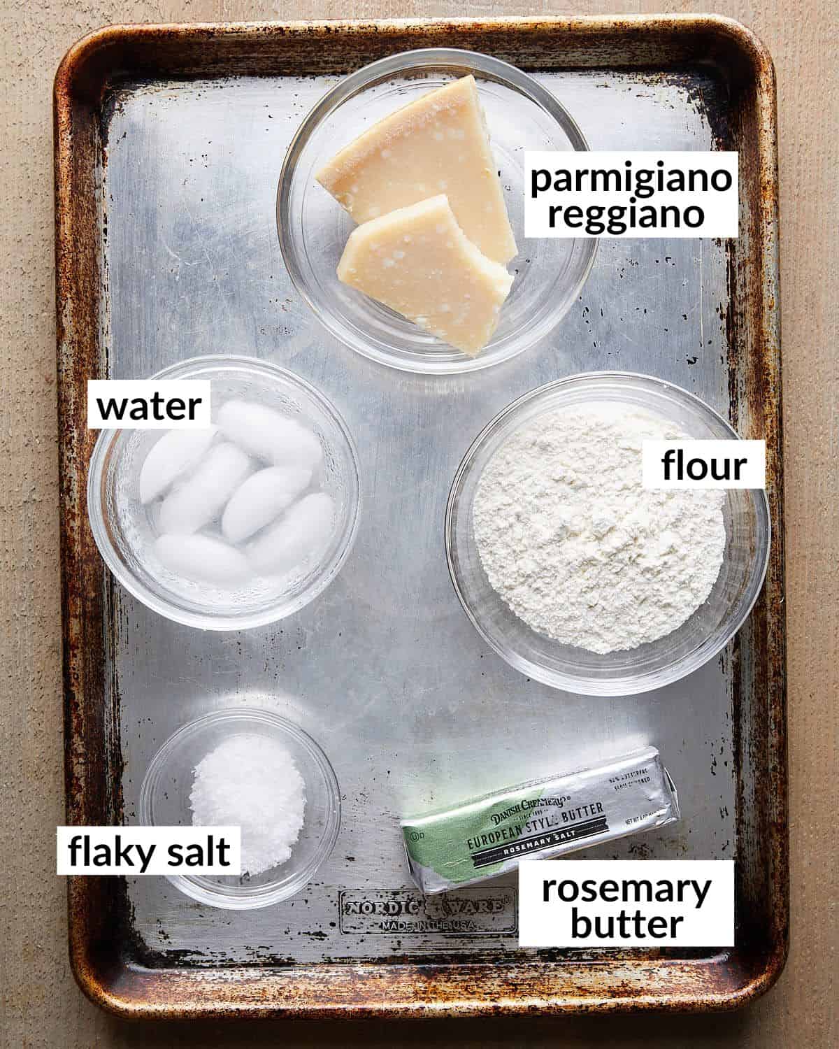 Overhead image of ingredients needed to make parmesan rosemary crackers.