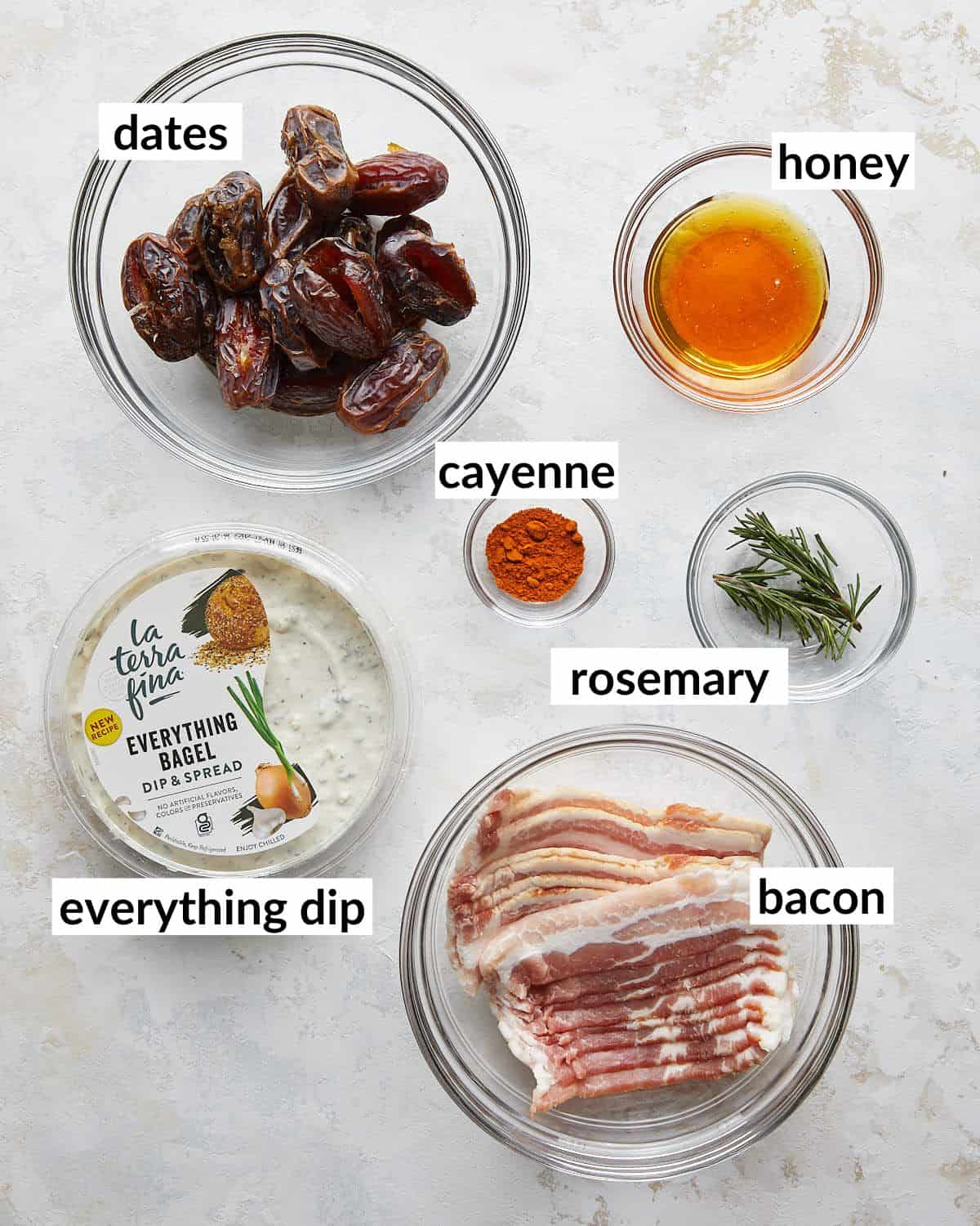 Overhead image of ingredients needed to make bacon wrapped dates with cream cheese. 