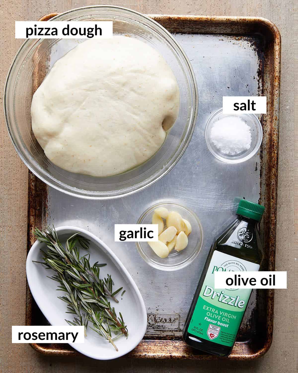 Overhead image of ingredients needed to make focaccia muffins. 