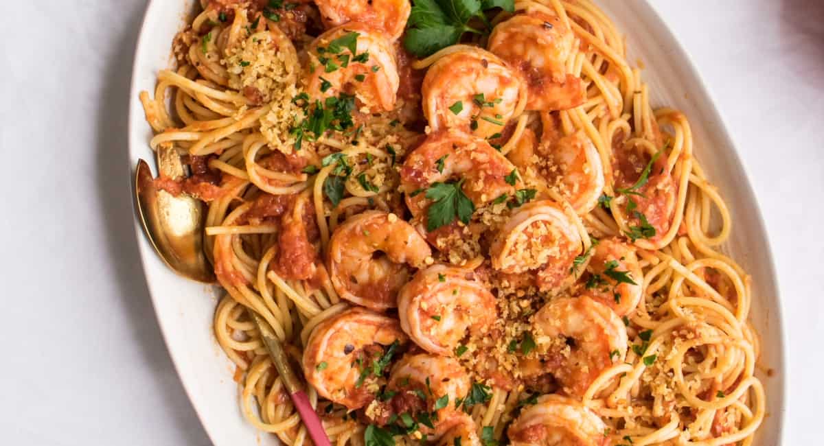 Overhead image of shrimp fra diavolo with pasta. 