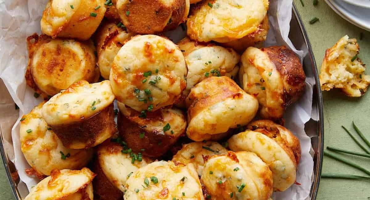 Overhead image of cheddar chive muffins. 
