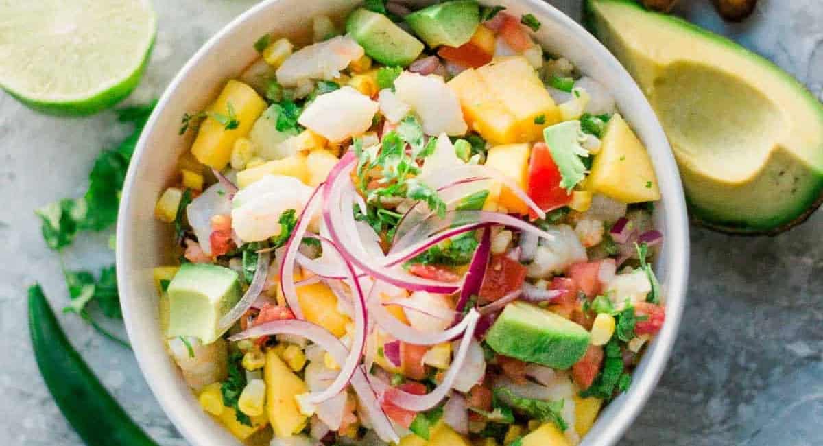 Overhead image of mango shrimp ceviche with avocado. 