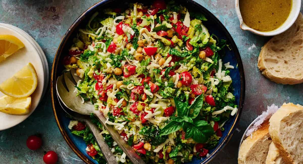 Overhead image of caprese chopped salad with zesty lemon dressing. 