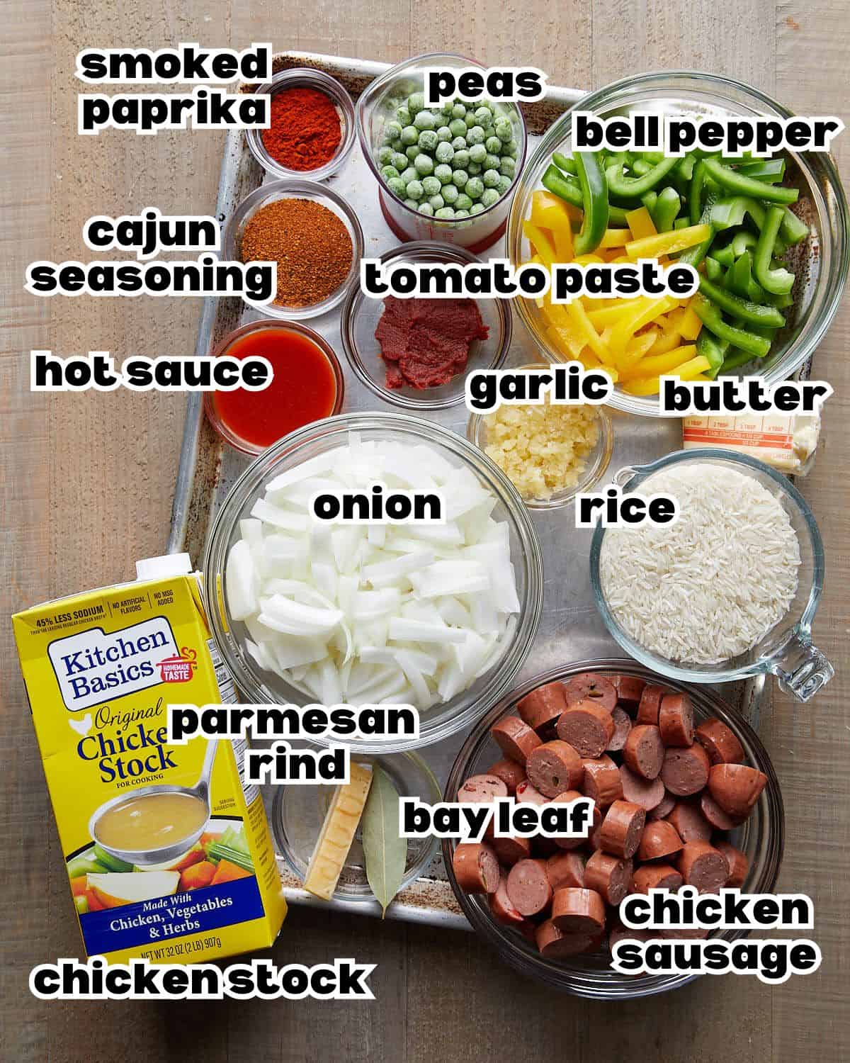 OVerhead image of ingredients needed to make chicken sausage and rice. 