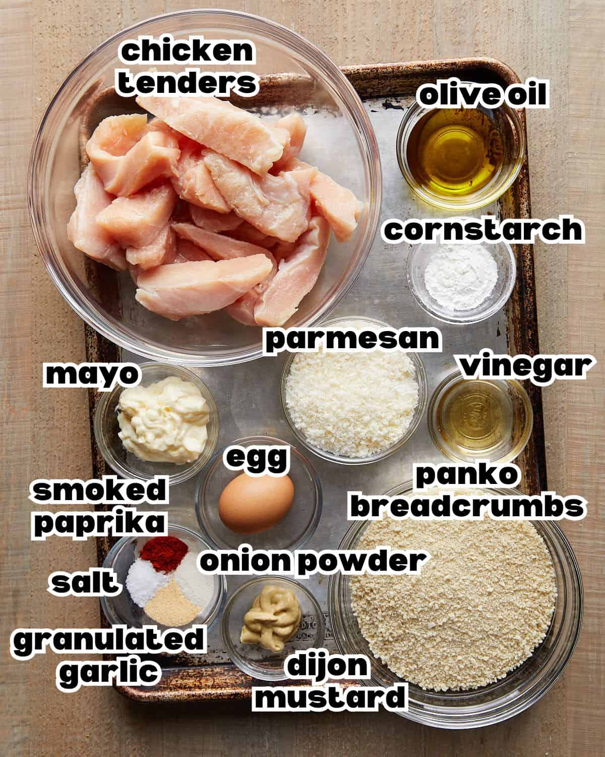 Overhead image of ingredients needed to make crispy chicken tenders. 