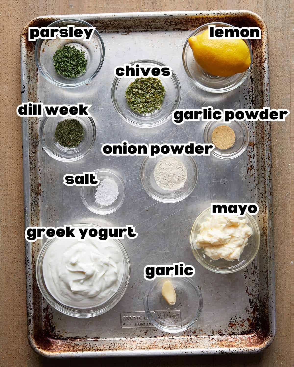 Overhead image of ingredients for homemade greek yogurt ranch dressing. 