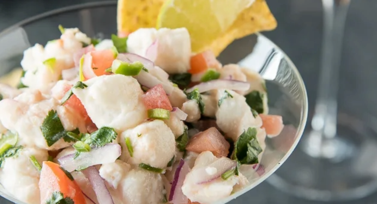 Up close image of halibut ceviche with garnish. 