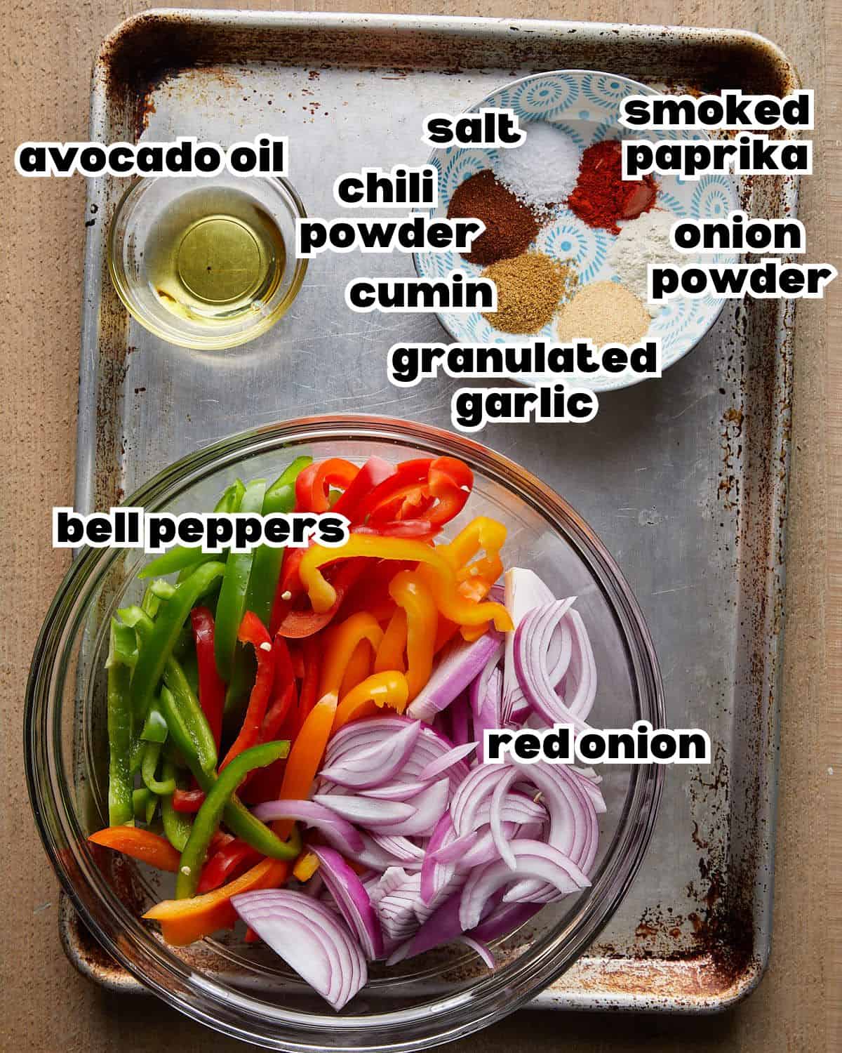 Overhead image of ingredients needed to make grilled peppers and onions. 