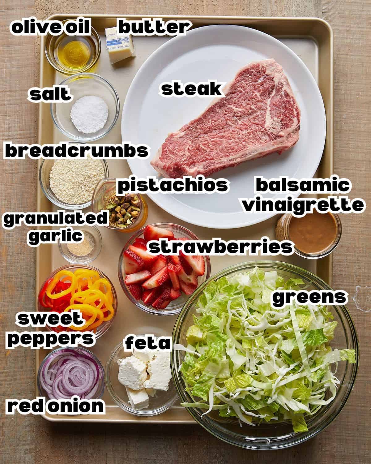 Overhead image of ingredients needed to make steak salad. 